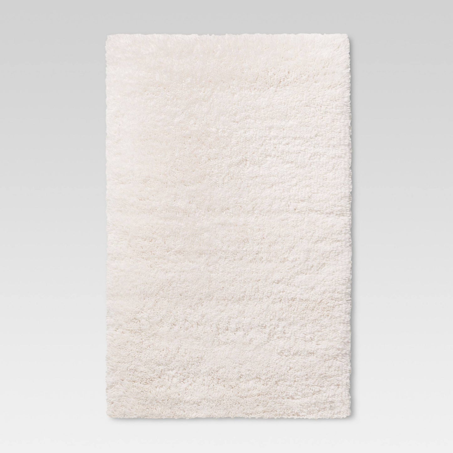 4'x5'6" Cream Plush Shag Washable Accent Rug - Room Essentials - Product image 1
