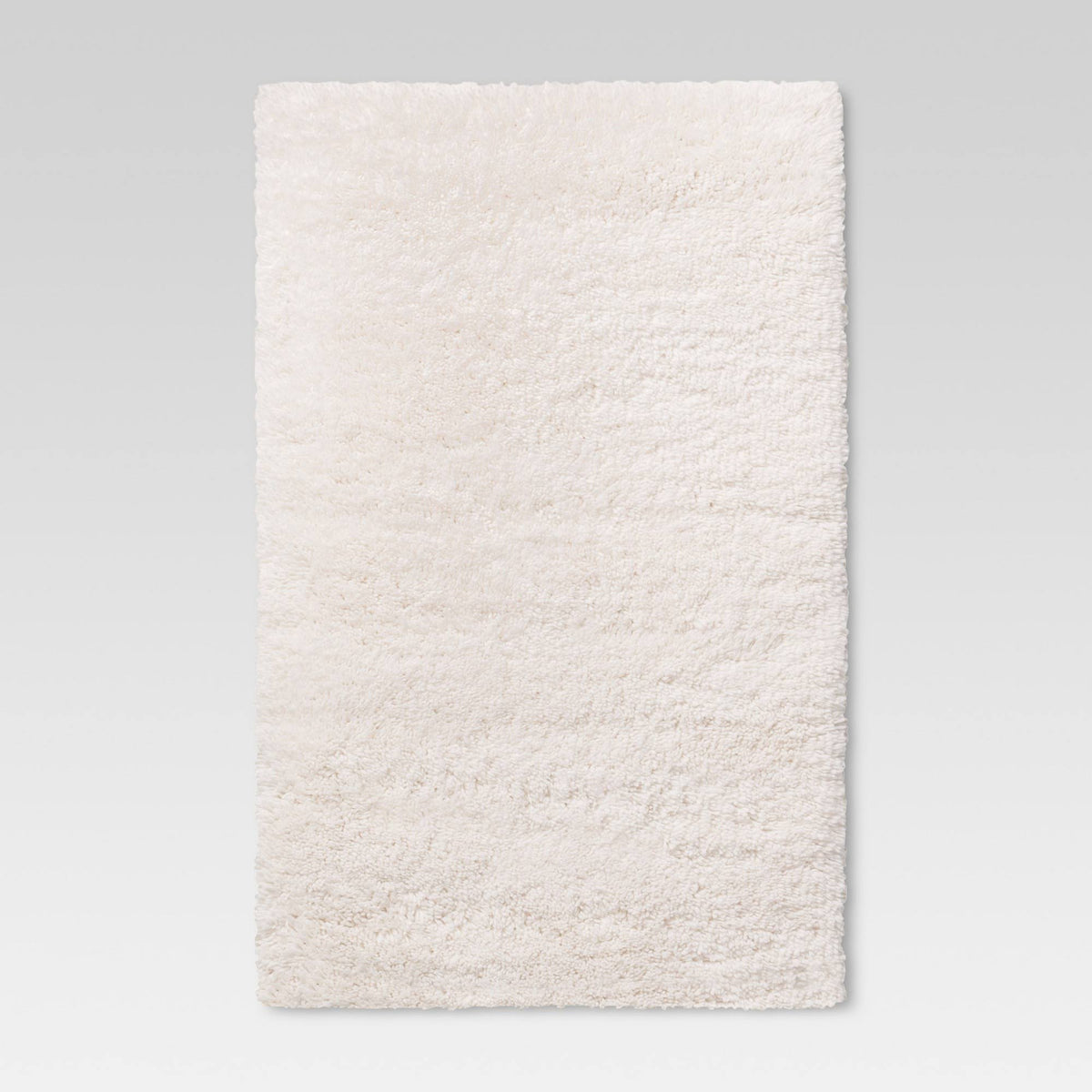 4'x5'6" Cream Plush Shag Washable Accent Rug - Room Essentials - Product image 1